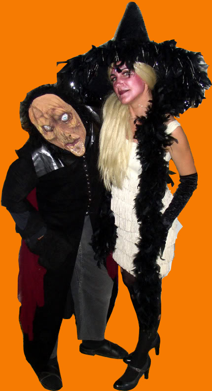 da-AL and her husband in Halloween costumes: monster and witch