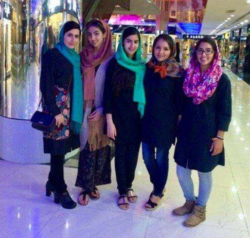 Rose and friends at a shopping mall in Shiraz, Iran. She addes, "Note the personal fashion, makeup, and hair being out."