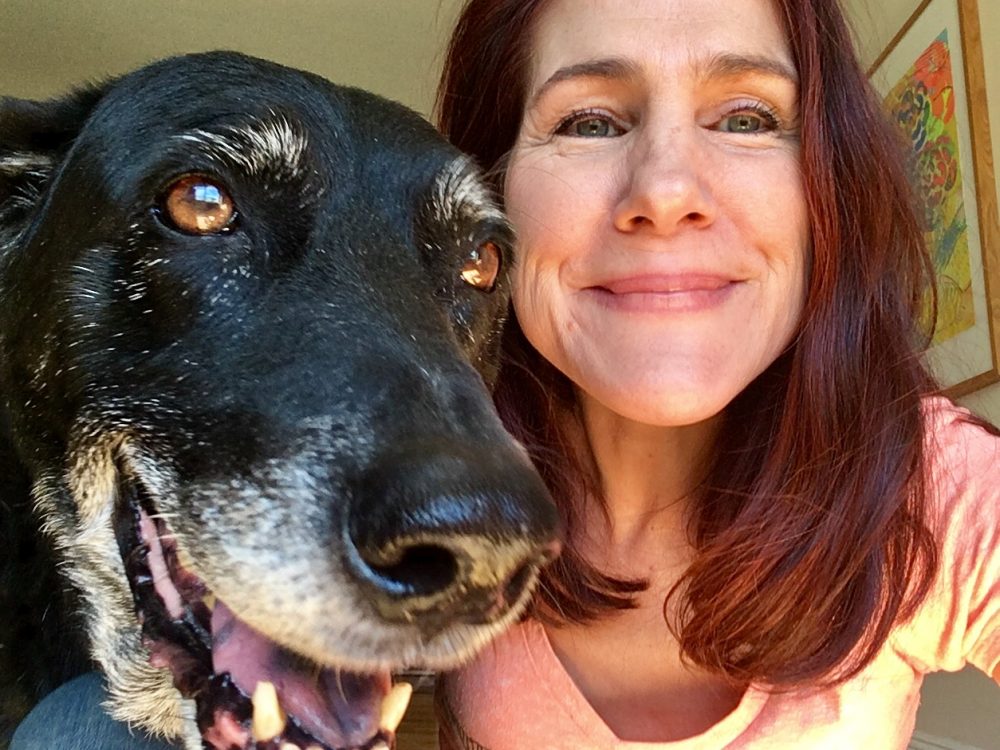 My dog and me, each of us happy and healthy.