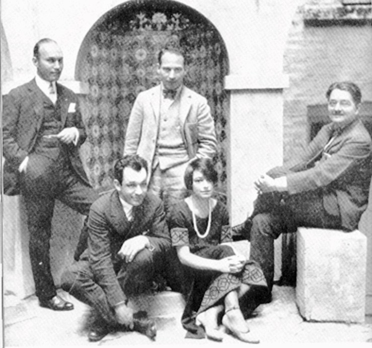 Members and associates of the Algonquin Round Table: (standing, left to right) Art Samuels and Harpo Marx; (sitting) Charles MacArthur, Dorothy Parker, and Alexander Woollcott