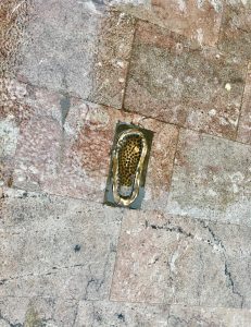 Footsteps mark the way along religious pilgrimage route El Camino de Santiago.