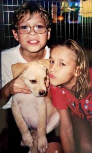 Joe and Katey Batavia joined Clifford in his crate. Photo by Cheryl Batavia.