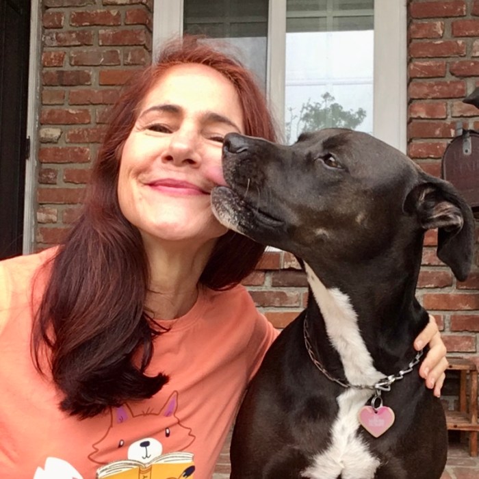 Photo of K-D-doggie giving da-AL a sloppy kiss.