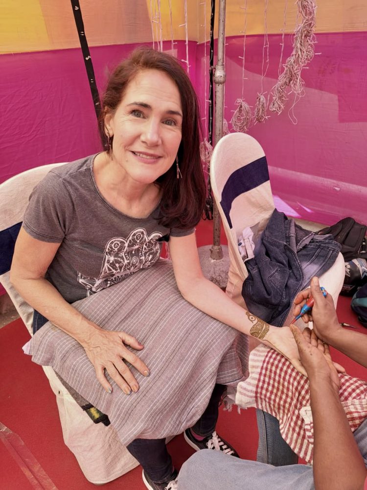 da-AL getting a henna tattoo at Giulia and Deep's wedding.