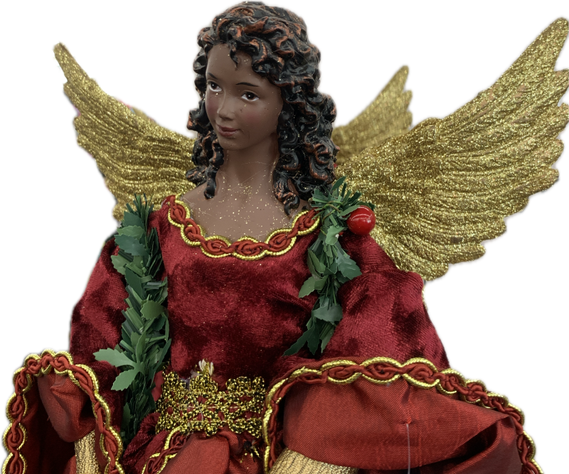 Photo of black angel statuette with golden wings