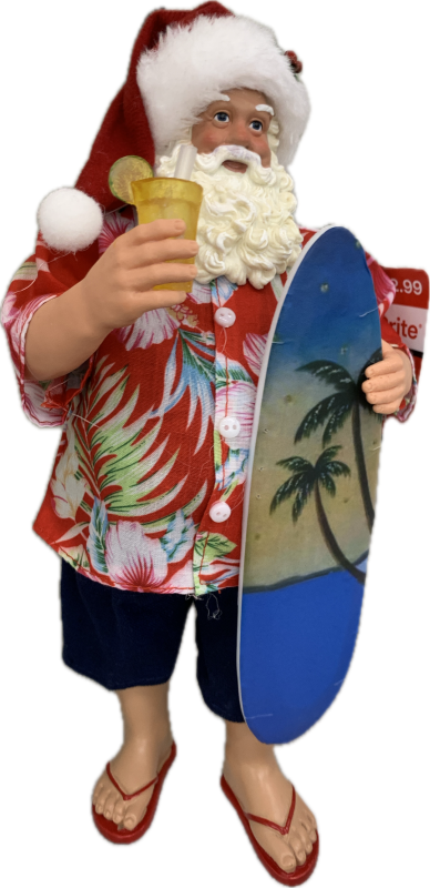 Photo of white man santa statuette in a colorful shirt and holding a surfboard