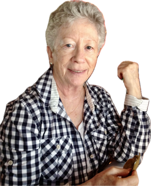Head and shoulders photo of writer Jean Colonomos, light-skinned, with short salt and pepper hair, white and black checked blouse.