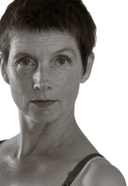 Tight black and white photo of author Freya Pickard.