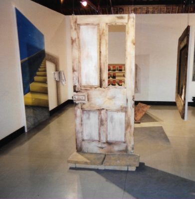 Installation art of a doorframe in an art gallery by Sara Allwright.