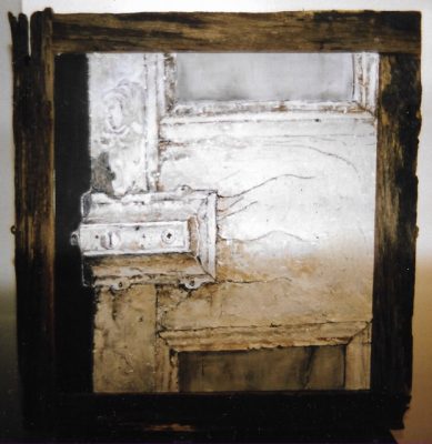 In her painting called Reveal, by Sara Allwright, she offers viewers a closeup detail of a door lock.