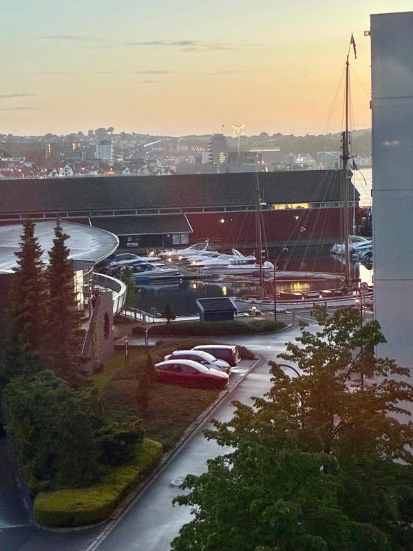 Hotel view of boats and sunset from our hotel in Stavanger, Norway.