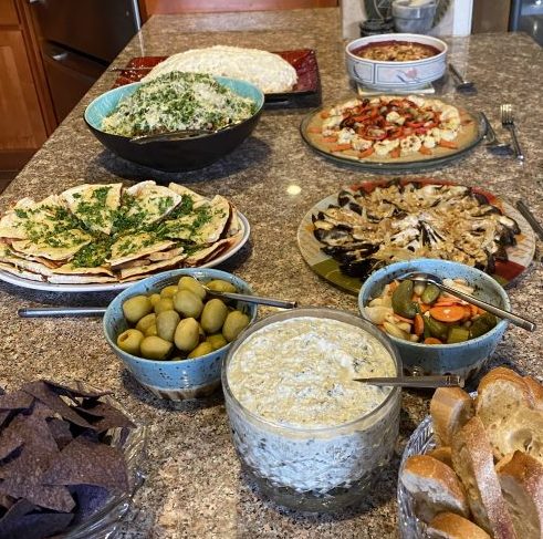 Photo of various finger foods Khashayar cooked and laid out prettily.